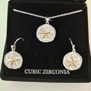 New in Box- two tone starfish earring and pendant set (adjustable chain)